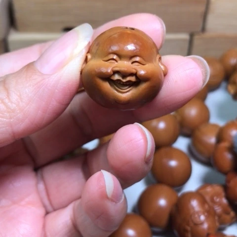 橄榄核吊坠北**贝橄榄核雕单件笑脸头