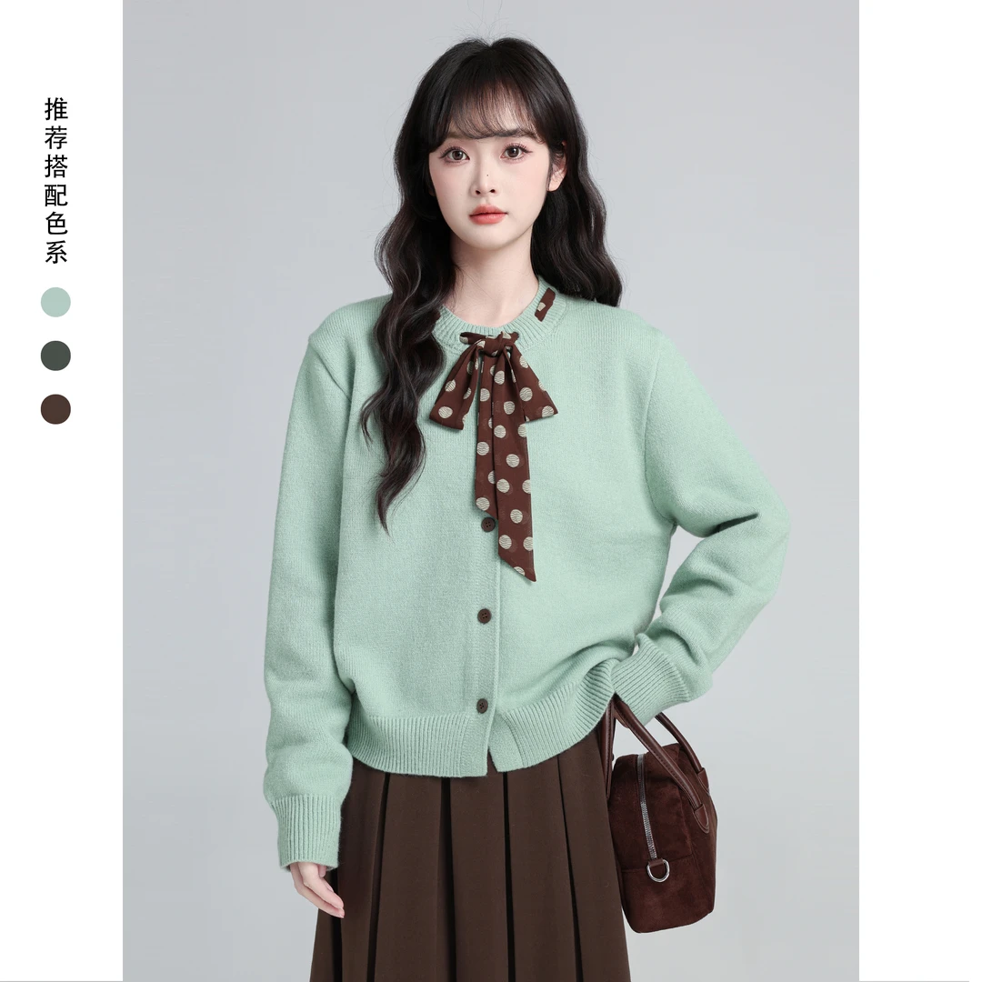 绿色蝴蝶结系带毛衣外套女秋冬2025冬季新款加厚圆领针织开衫上衣