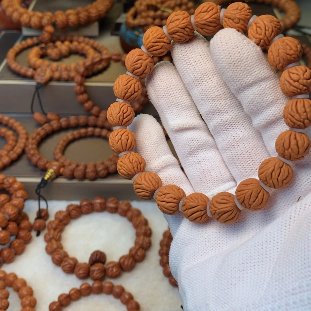 小***习手串桃核秦岭龙纹