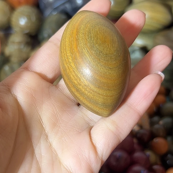 木诸***荡阿根廷绿檀个性手把件