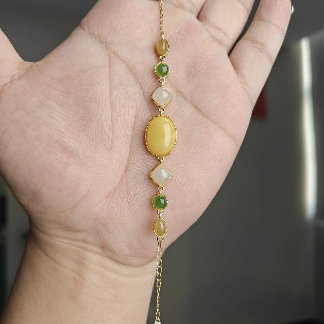 约10*14mm蜜蜡和田玉多宝S925银手链