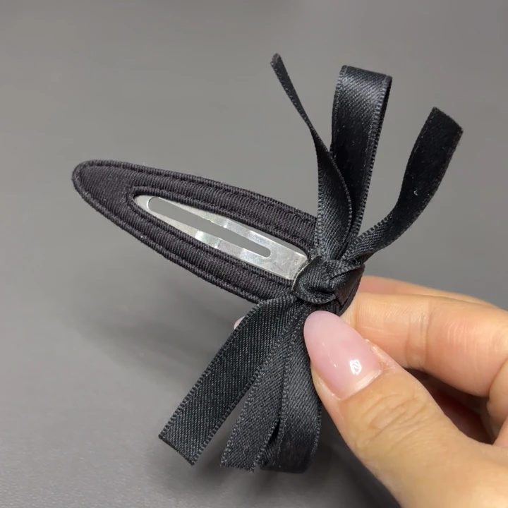 皮质铁合金蝴蝶结拜拜