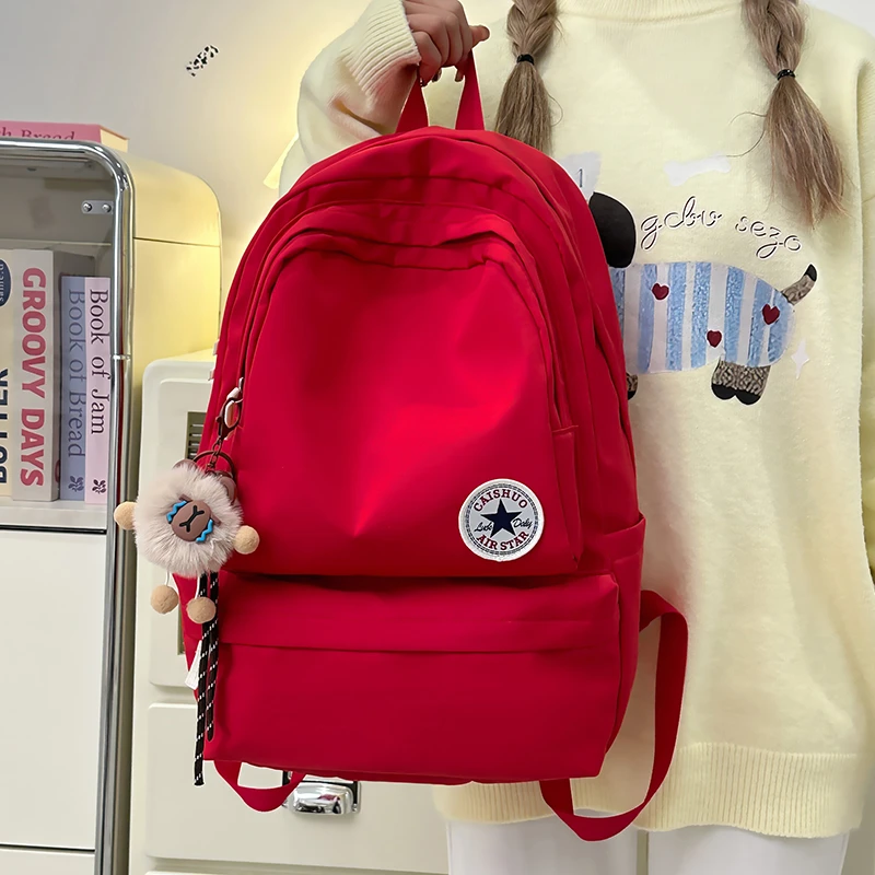 新款大容量日系学生书包斜挎包双肩包初中生高中生休闲轻便