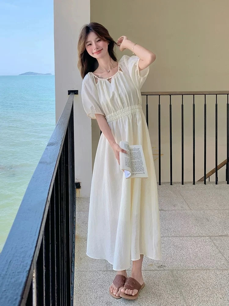 S39法式长裙镂空法式米黄压褶连衣裙甜美显瘦裙子慵懒风