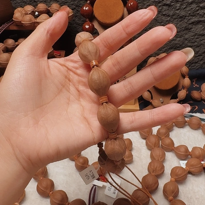 金***哥木质1624三面佛梅林铁核