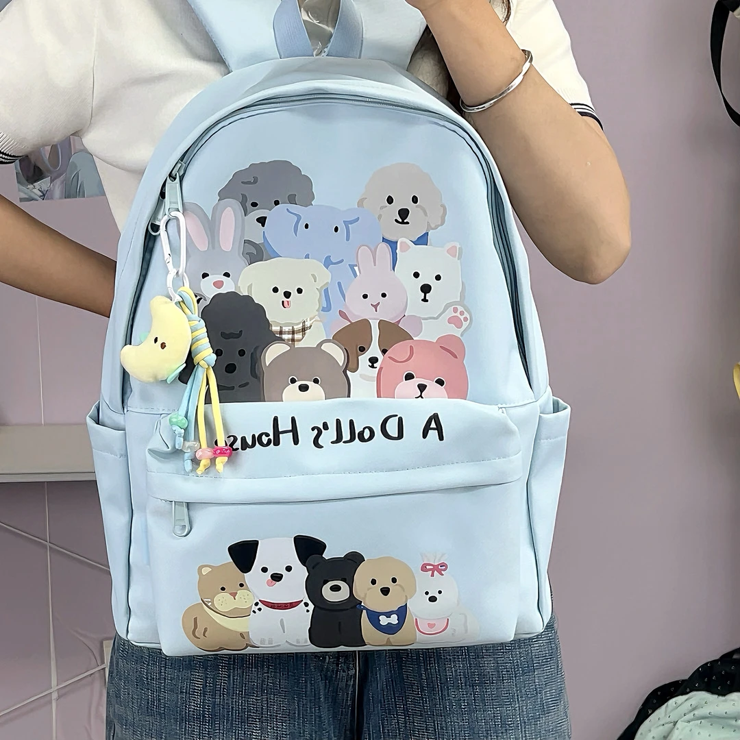 高颜值可爱涂鸦书包女初中生高中学生百搭软妹双肩包旅行轻便背包