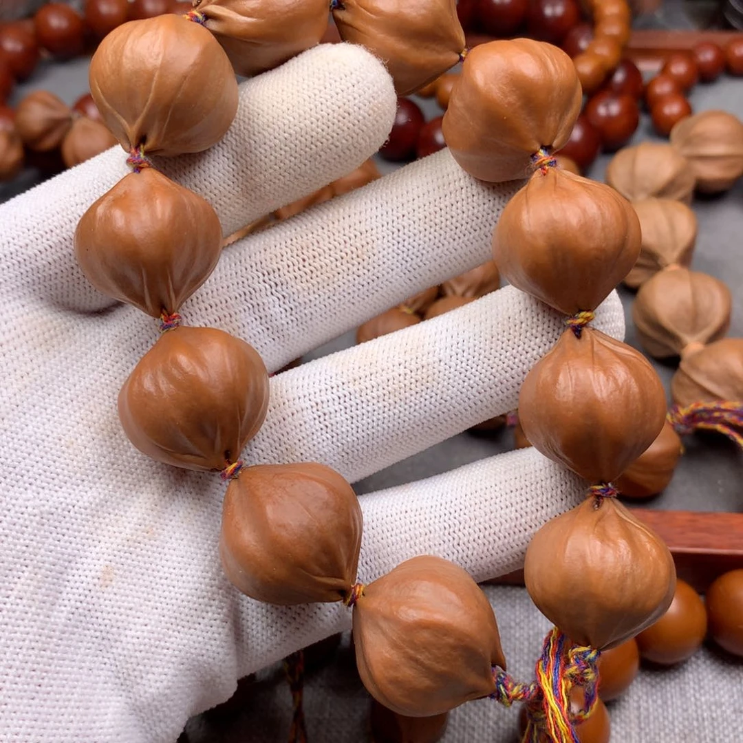 橄榄核手串博*洺2.2四花素串