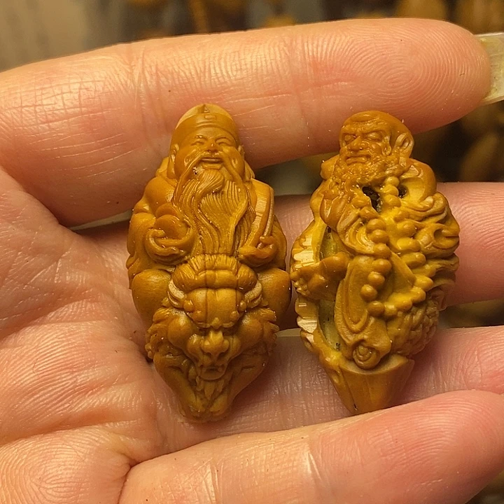 橄榄核雕刻单子财神
