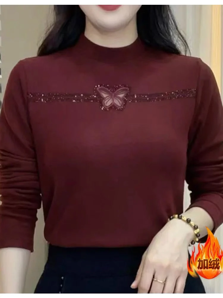 2487加绒加厚重工胸间蝴蝶镂空秀打底衫