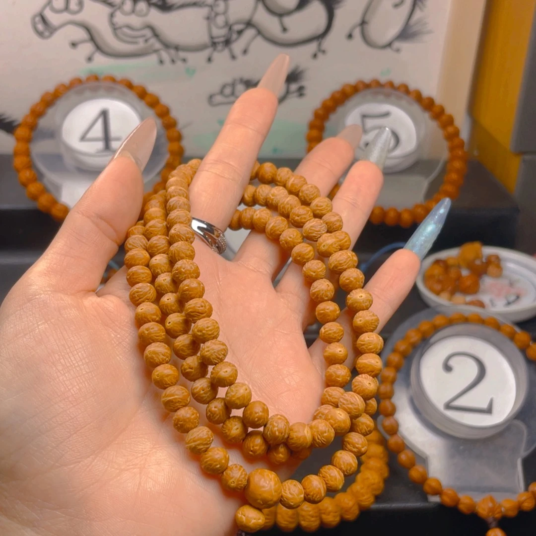 言***欢桃核吊坠0.77777777