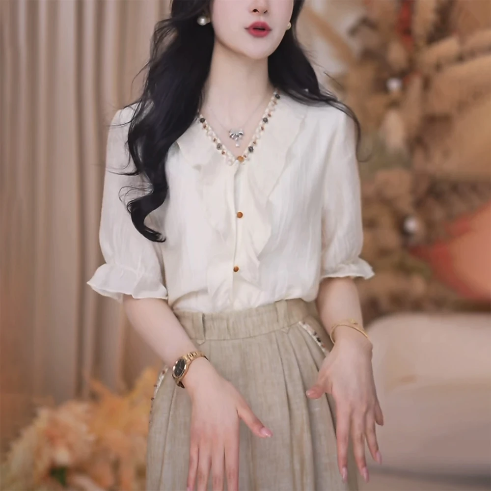 重工钉珠白色衬衫女2025夏季时尚显瘦减龄轻奢高级感中袖v领上衣