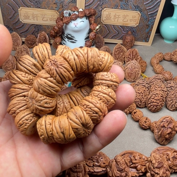 桃核手串桃核雕刻猪大肠手串