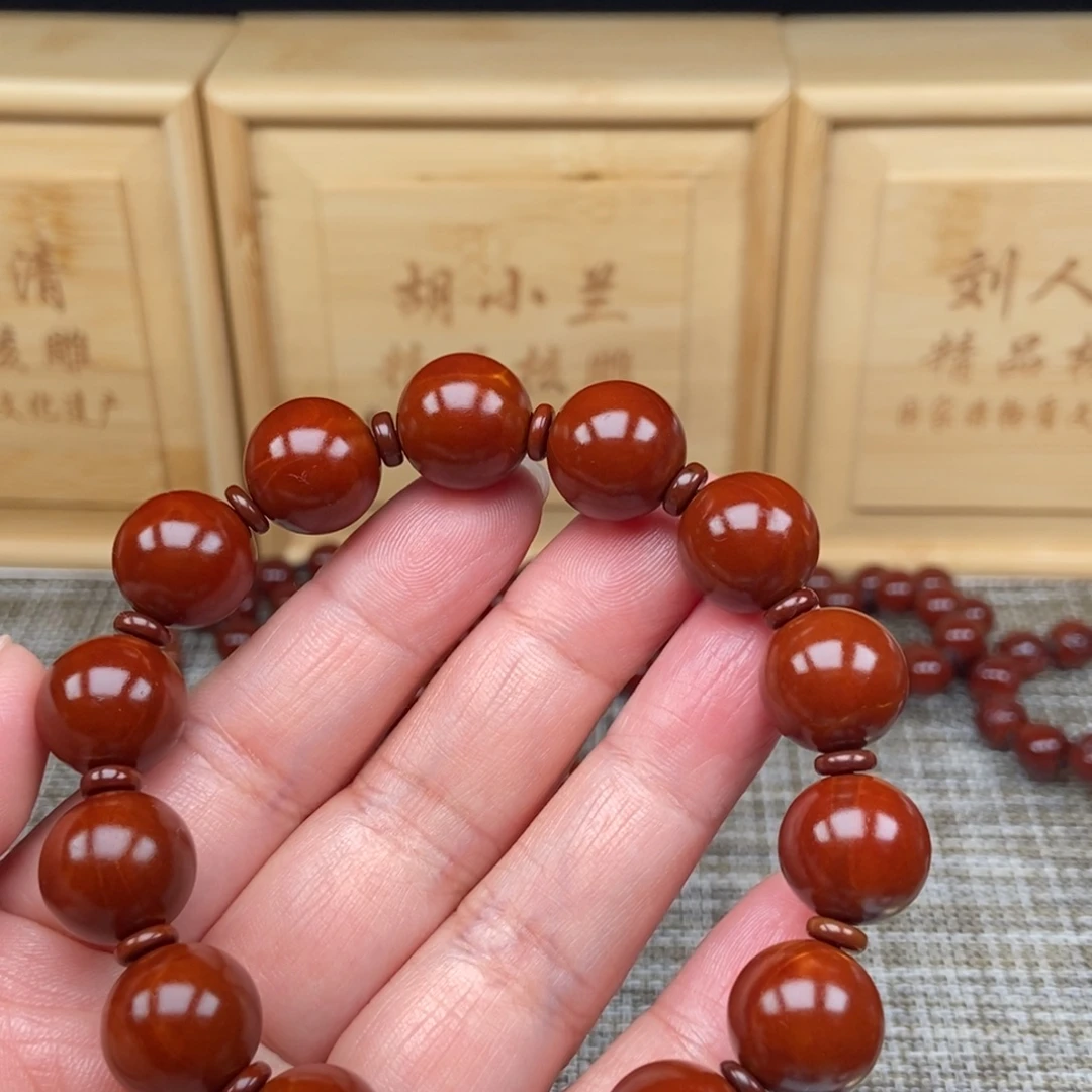 罗***吊坠橄榄核光珠88