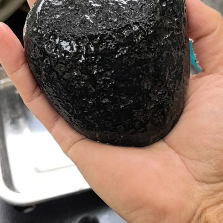 石材?****?藏玉药王石原石手把件一个