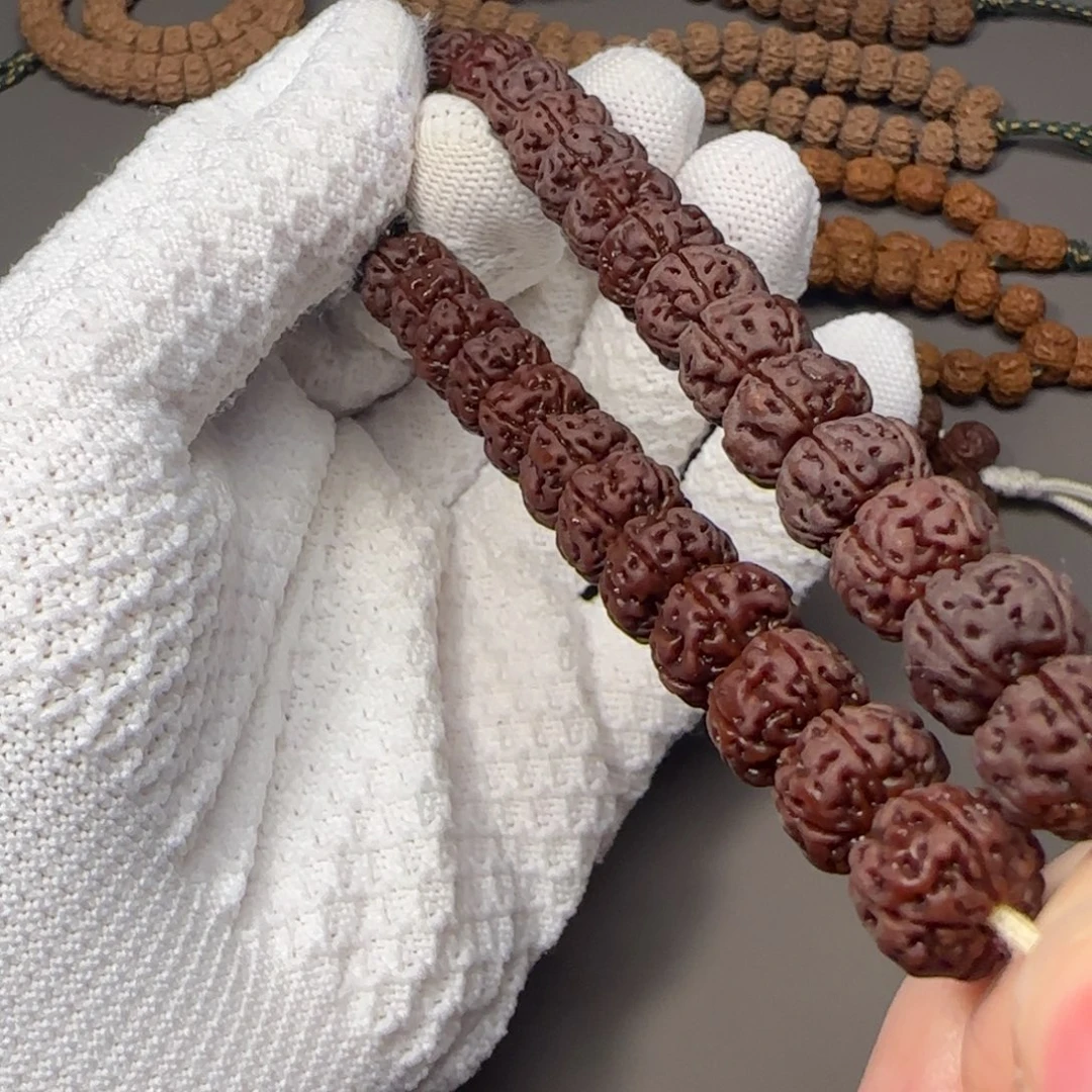 锦***鲤金刚菩提吊坠顶级勿里达老树王手持