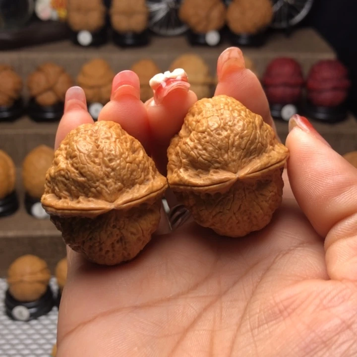 橄榄核吊坠1呱呱来财