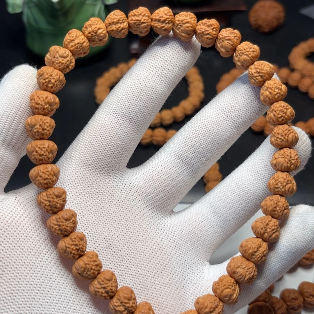 猴头核桃手串悠**尘小馒头料子雕刻京八棱手串