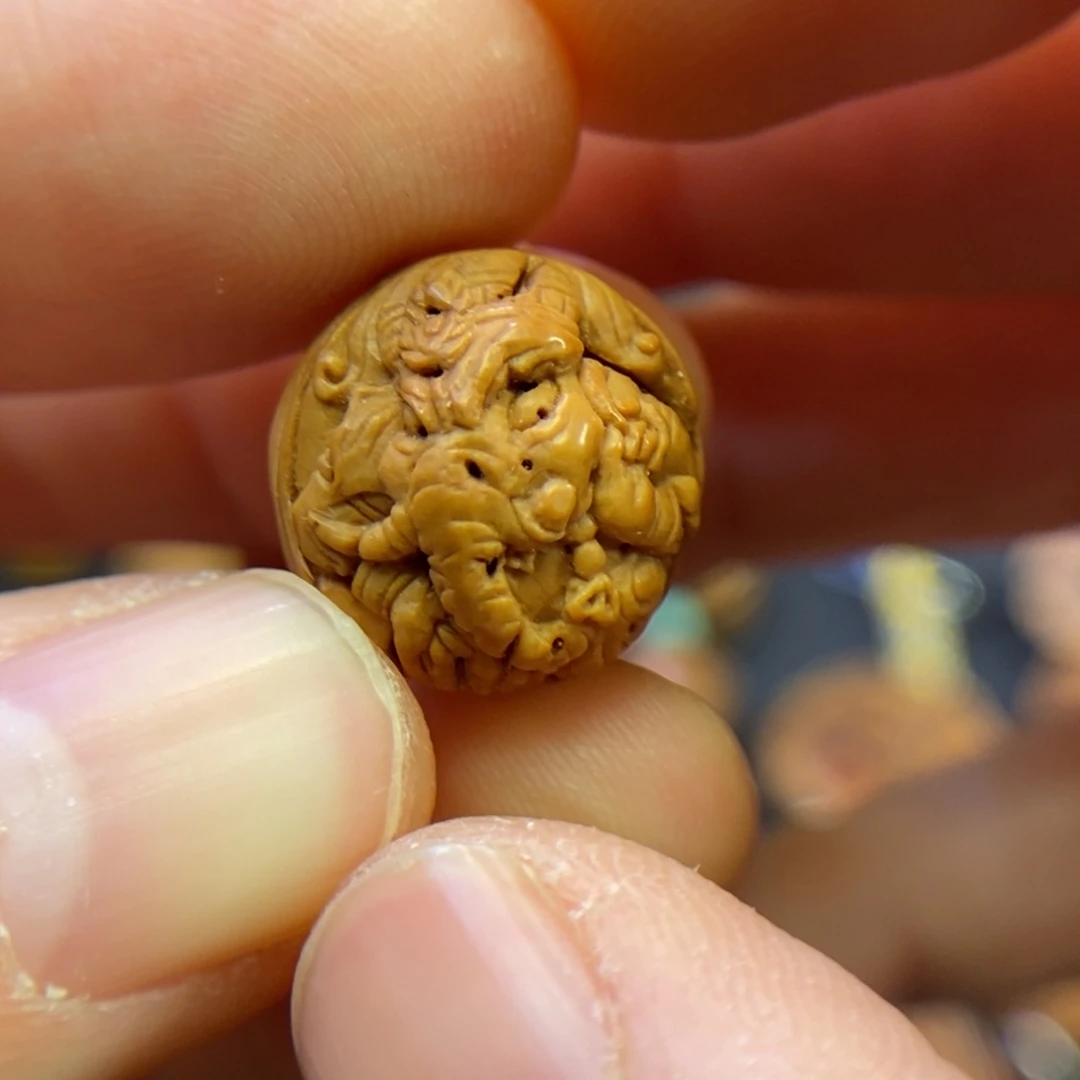 潍坊核雕桃核雕刻象神