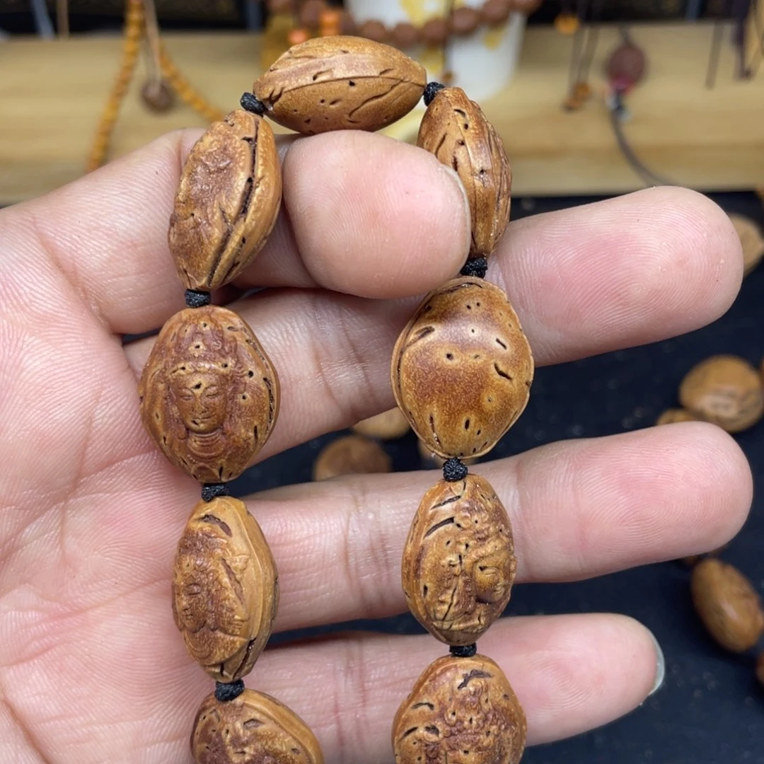 桃核雕刻观音手串