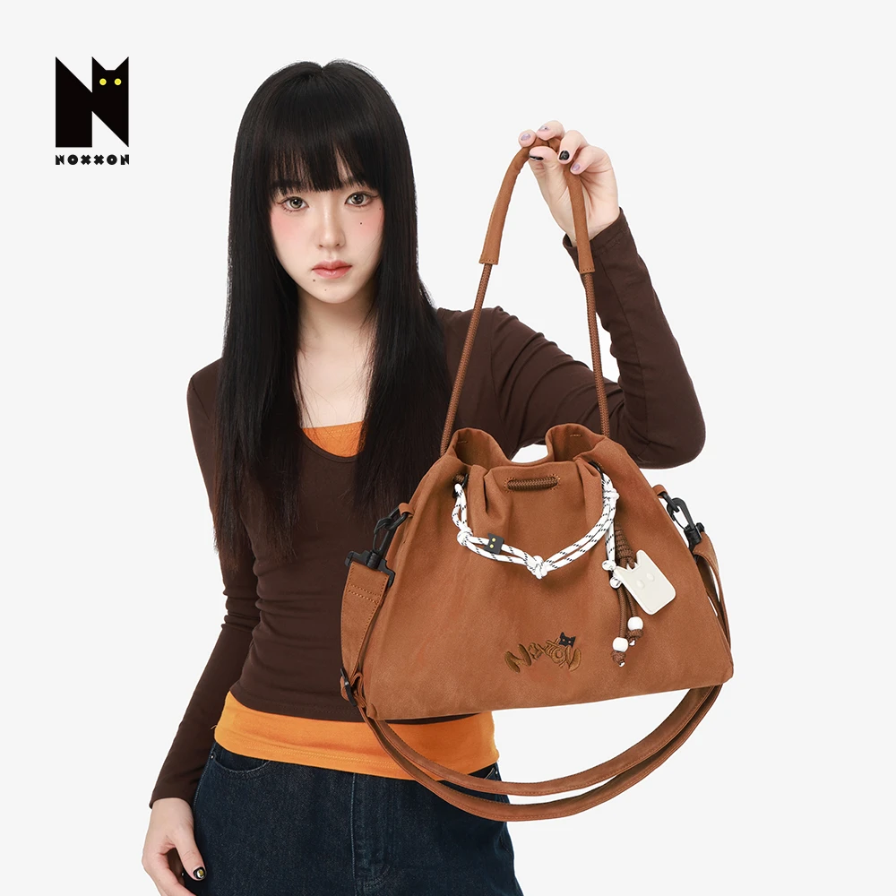 NOXXON少女风单肩包抽绳水桶包斜挎包韩版甜美大容量通勤包ND0312
