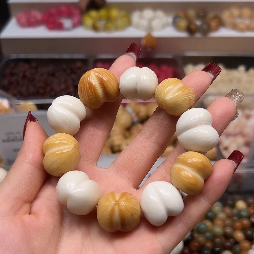 手串菩提根/象牙果瑕疵炭烤多宝拉丝屁桃1条左右孔有裂