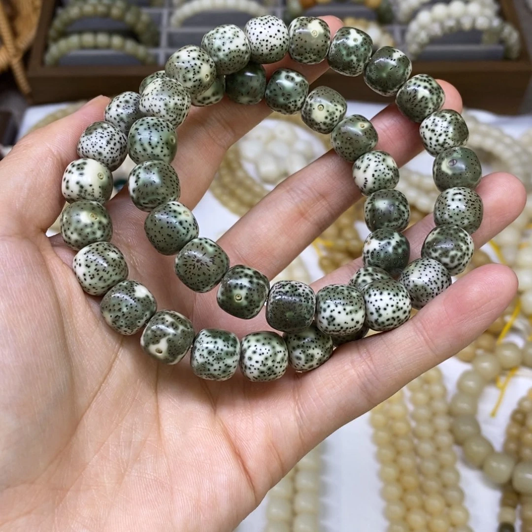 吊坠菩提根/象牙果海南石玉料卡12老型桶珠手串