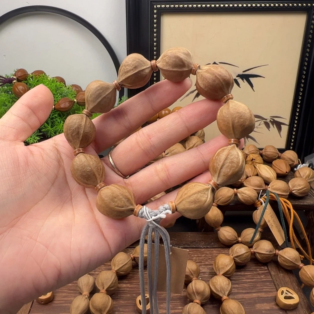 手串橄榄核19.22梅林铁核