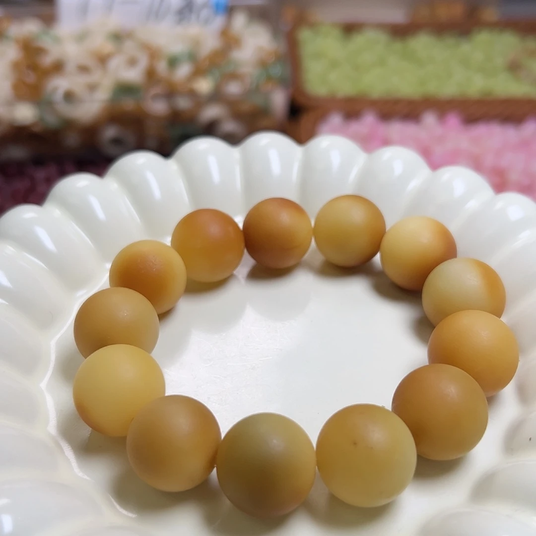 白玉菩提吊坠瑕疵18磨沙圆1条