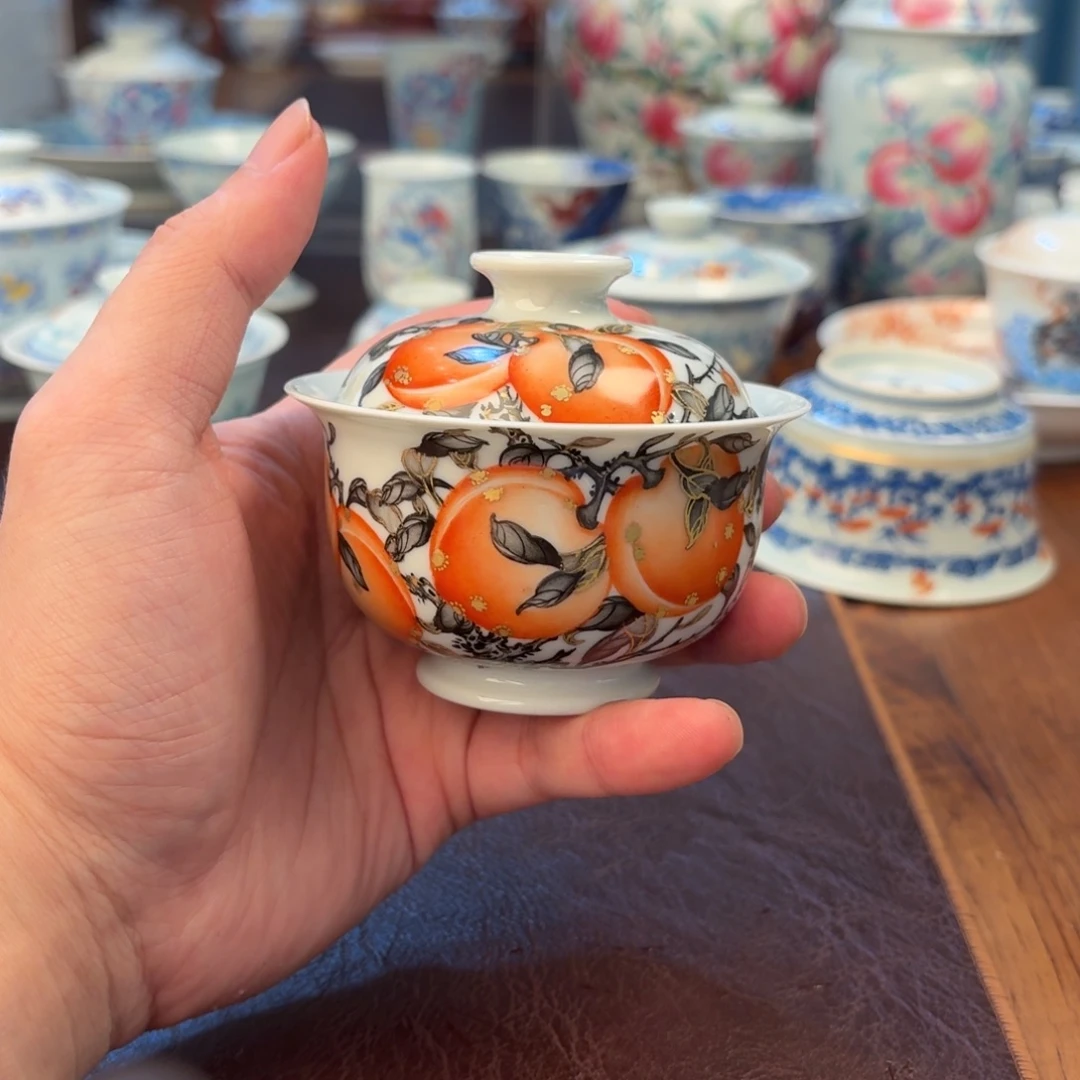 墨彩描金矾红九桃五福