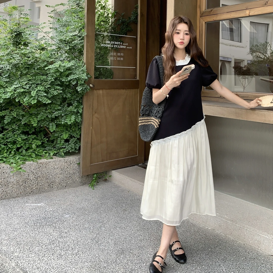 黑白撞色连衣裙女2025夏季新款韩系ins风独特设计感不规则拼接裙