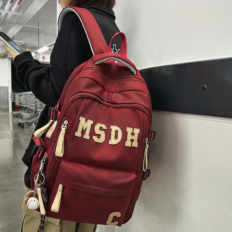 书包女休闲百搭初中生高中大学生减负轻便双肩包潮酷男款电脑背包