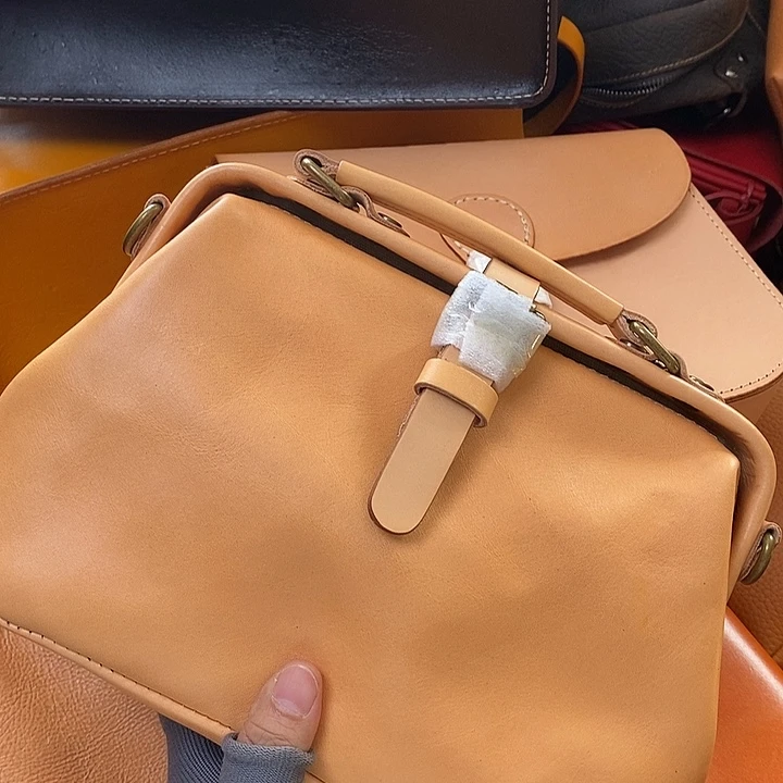 头层牛皮瑕疵单肩包