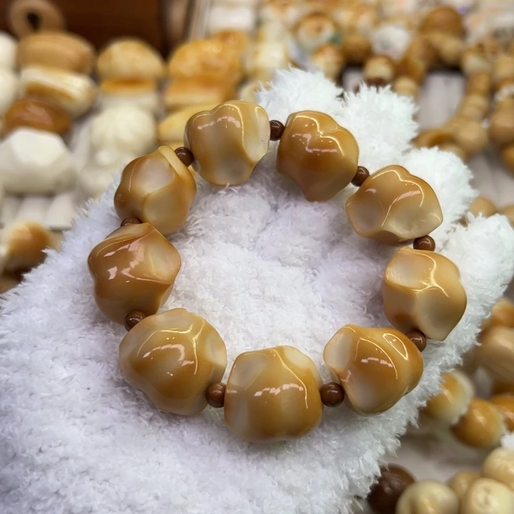 把件菩提根/象牙果61 象牙果原果雕刻炭烧元宝饺子微瑕