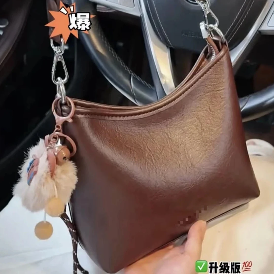 包包女2025新款潮韩版时尚大容量百搭纯色PU皮复古单肩斜挎水桶包