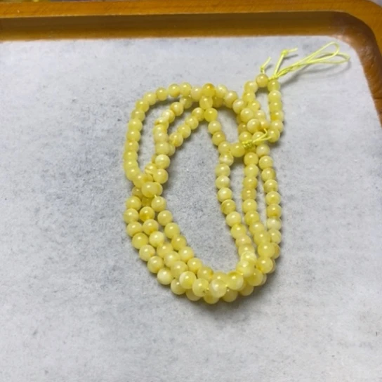 蜜蜡裸石未镶嵌串