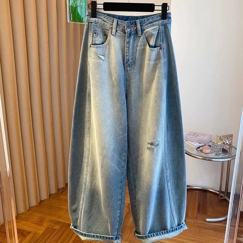 韩国东大门破洞弯刀阔腿牛仔裤女春秋2025新款宽松高腰显瘦镰刀裤