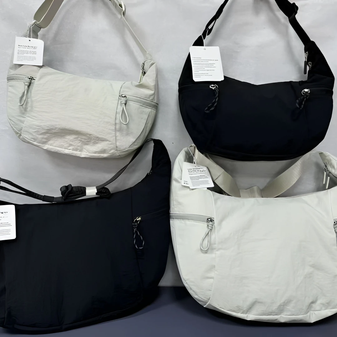 休闲通勤运动斜挎牛角包