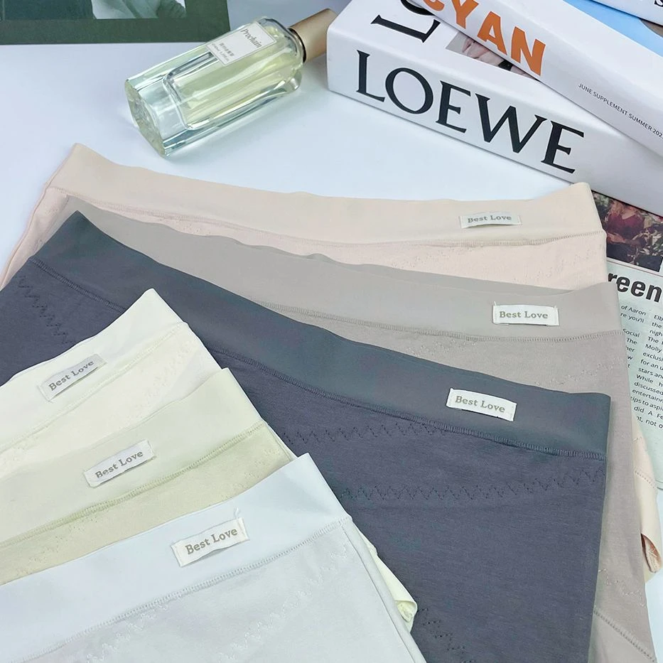 新款棉质交叉收腹无痕中腰收小肚子包臀透气舒适女士三角裤内裤