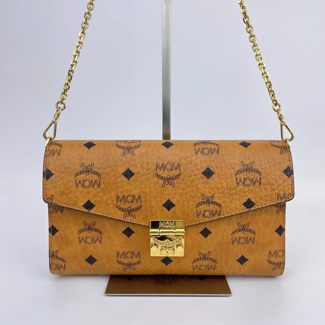 95新 MCM MCM 干邑色老花单肩包底长23 N297