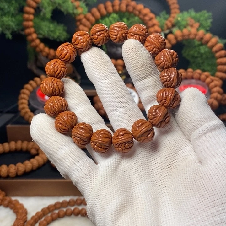 桃核吊坠退****陆秦岭龙纹