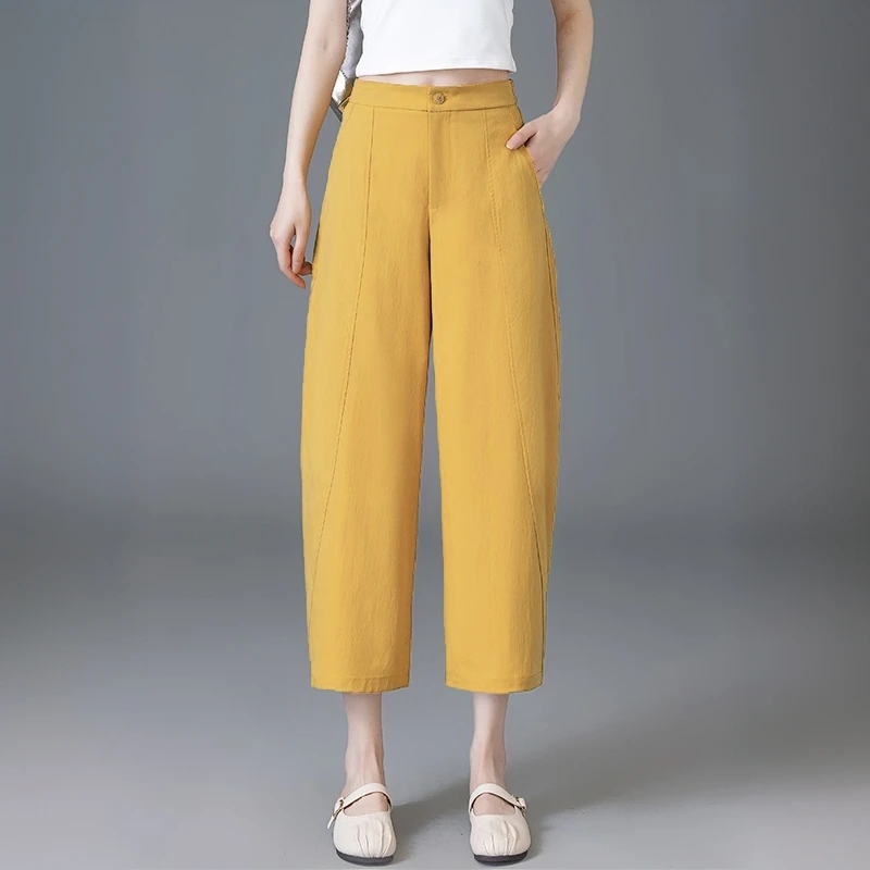 黄色弯刀裤女2025夏季新款薄款冰丝大码显瘦八分休闲萝卜镰刀裤子