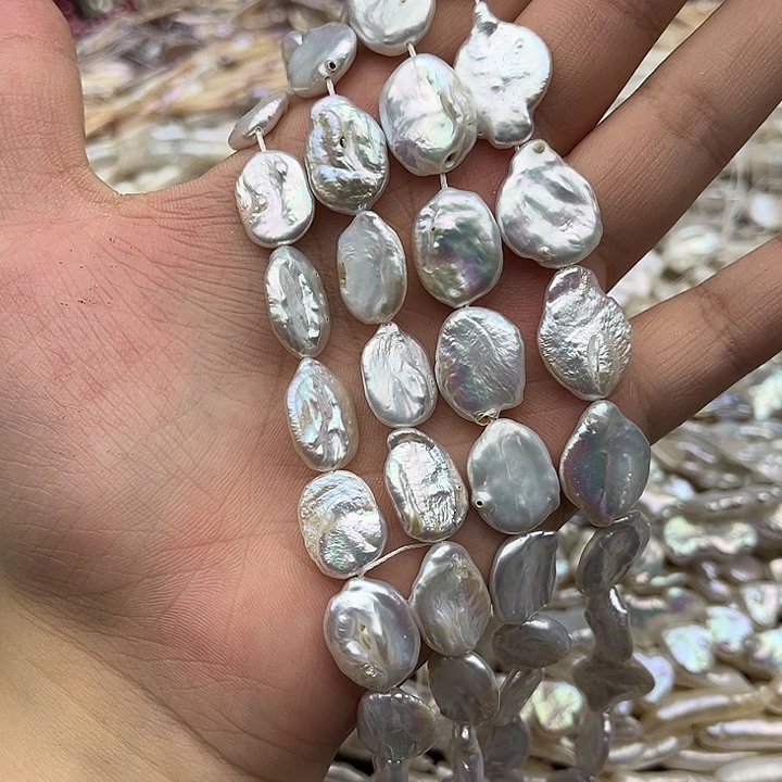 舒***儿玛瑙/玉髓未镶嵌珠宝半成品一条椭圆巴洛克珍珠有生长孔