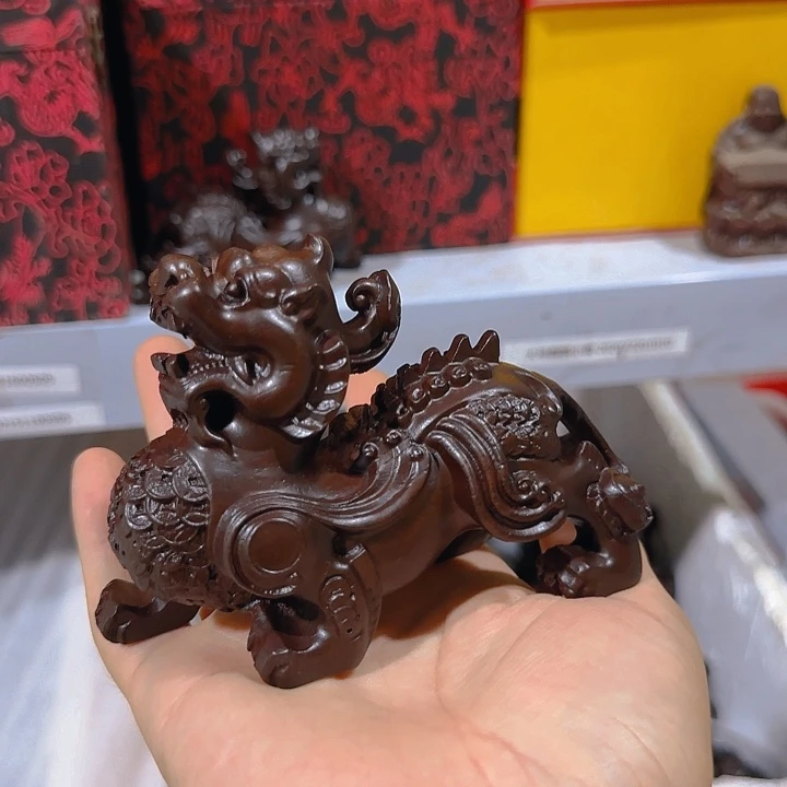 木黑檀木12金钱貔貅一只