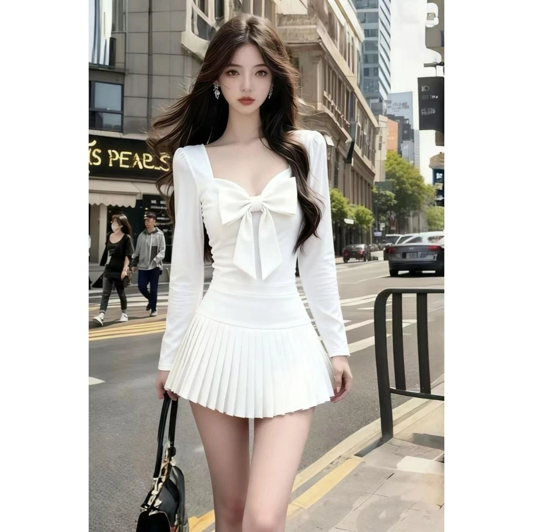 秋冬季日常高级温婉知性风白色V领长袖收腰蝴蝶结元素百褶连衣裙