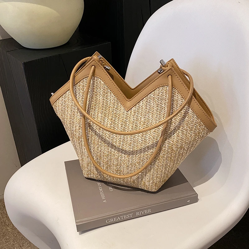 佐猫春夏小众编织包包2025新款时尚百搭单肩包海边沙滩假日编制包