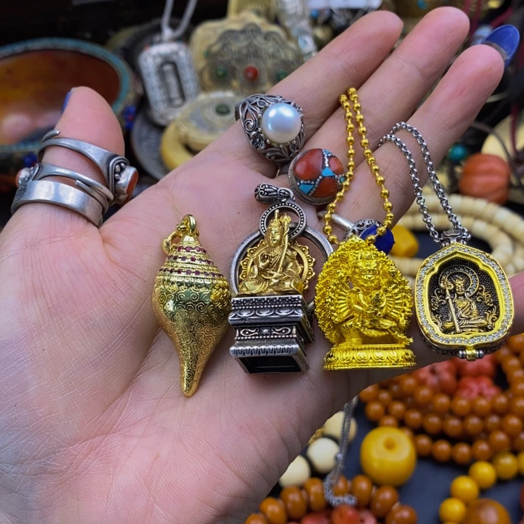 浅***贝泥塑擦擦的吊坠和