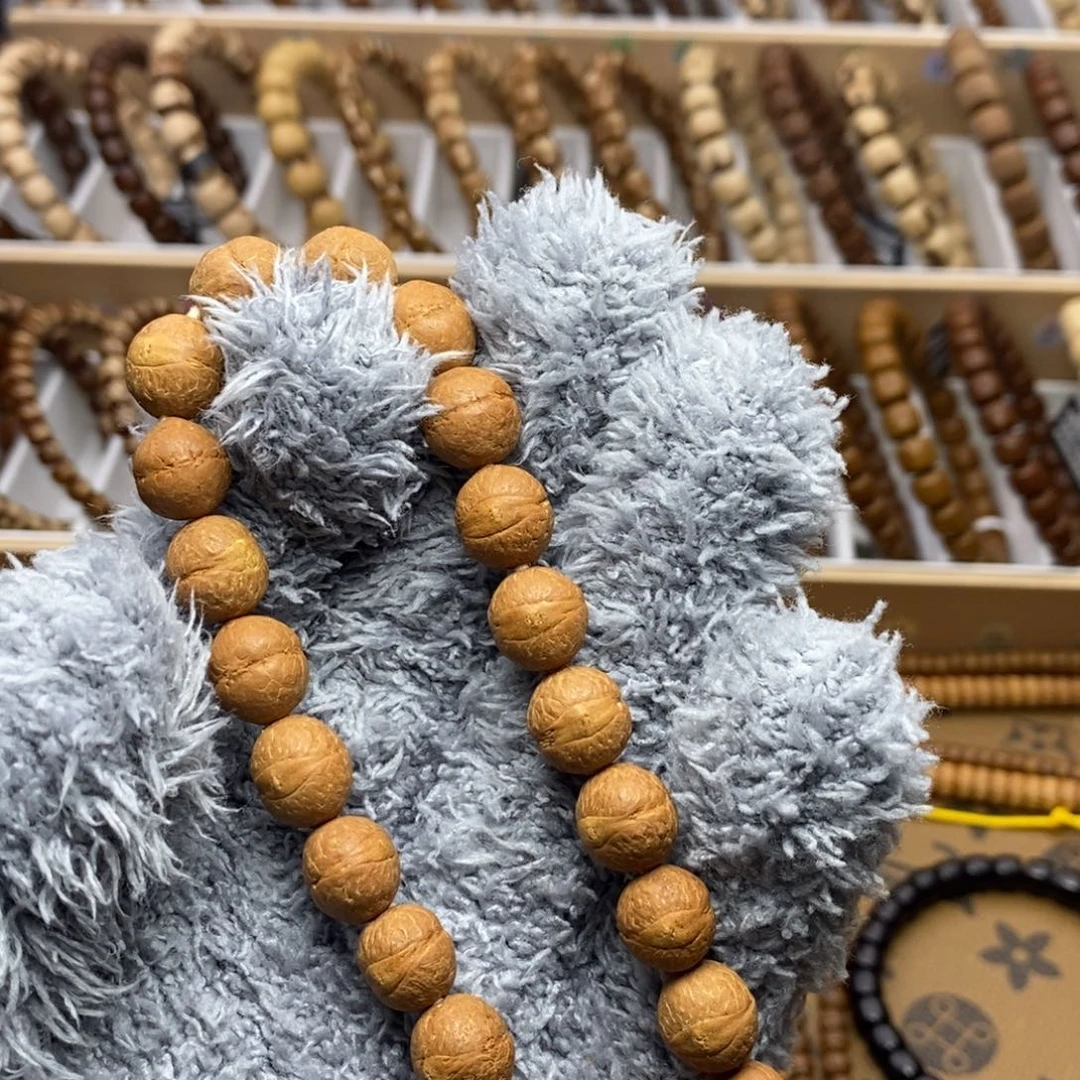 辰***生手串紫金鼠凤眼实心10