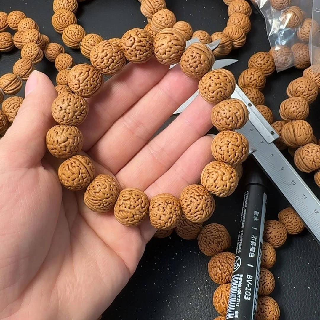 L***n桃核吊坠野生手串