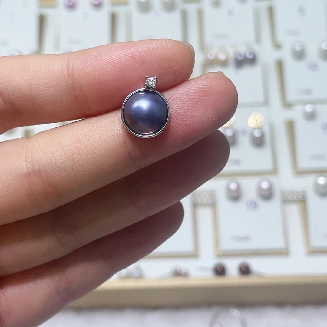 耳饰银S925镶嵌拼合珍珠（马贝珠）黎*。