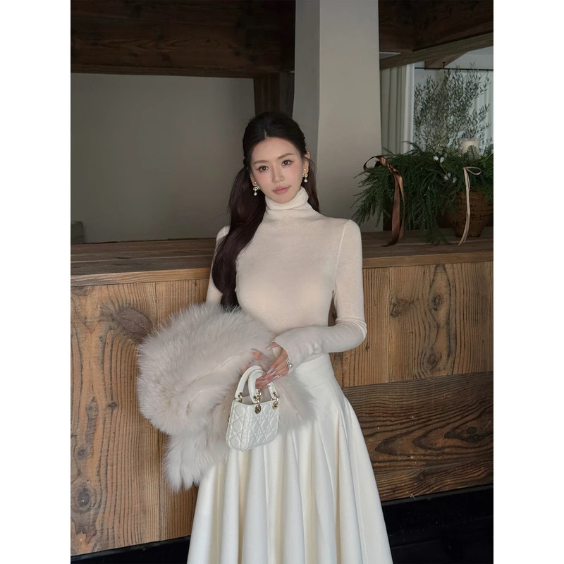 薪薪 【织裥密语】百搭圆领显瘦气质修身羊毛针织上衣 T508090